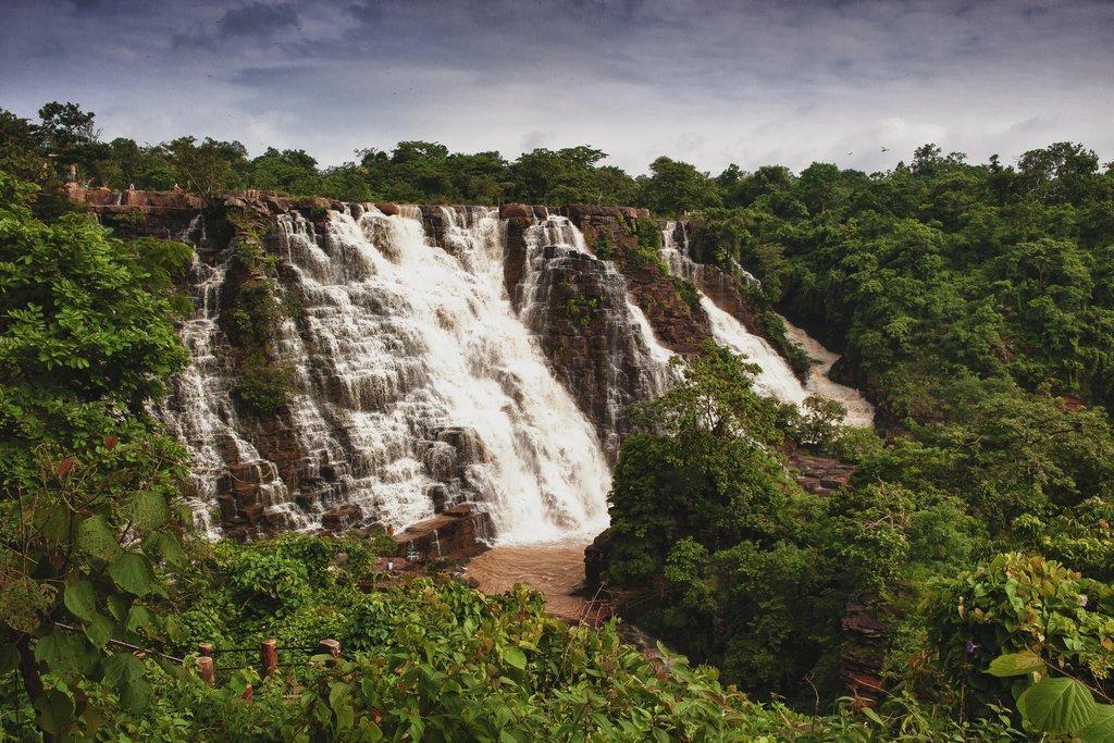 Multi-tiered Tirathgarh Falls cascading through the forest in Kanger Valley