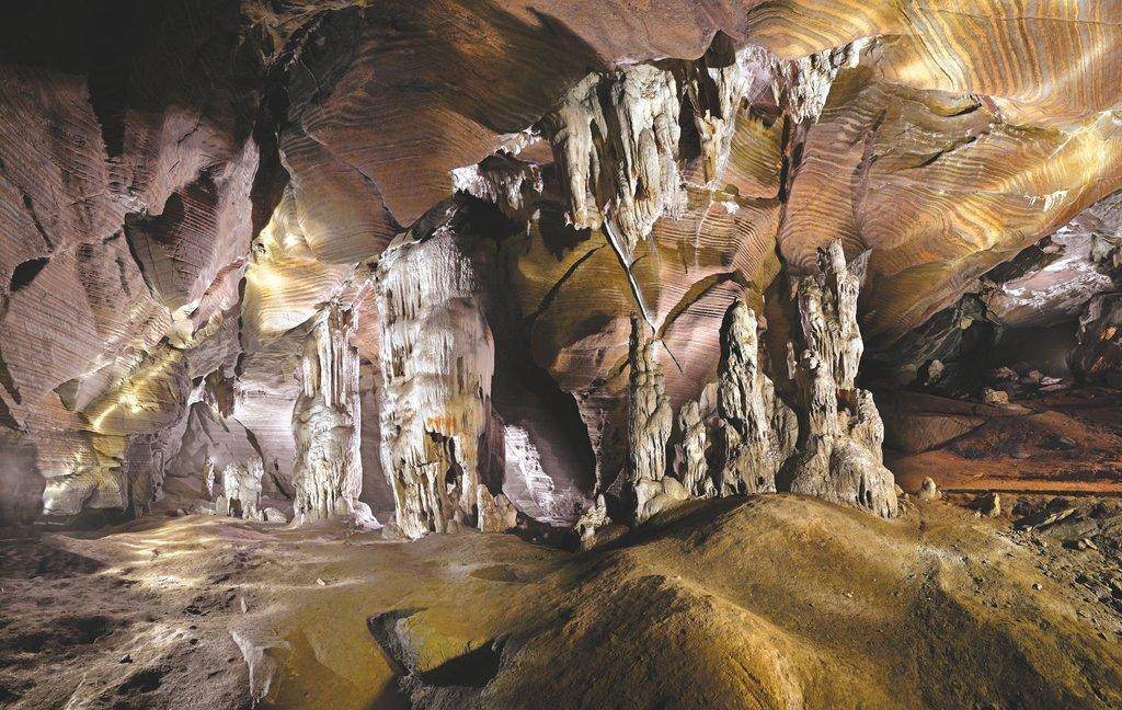 Stalactite and stalagmite formations inside Kotumsar Cave